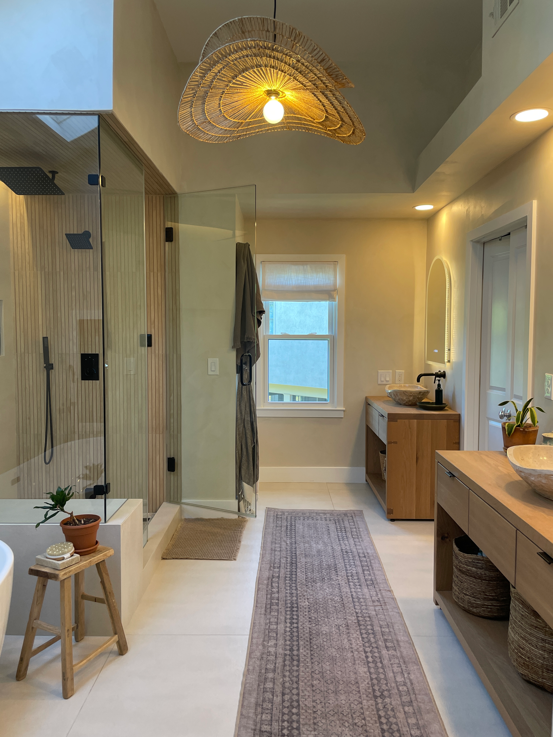 Glass shower in the renovated primary bath